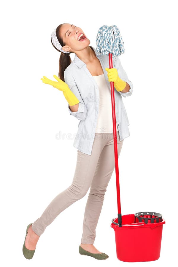 Spring cleaning woman singing fun using mop isolated on white background. Mixed race Caucasian and Asian young housewife having fun doing chores with cleaning mop and bucket for floor washing. Spring cleaning woman singing fun using mop isolated on white background. Mixed race Caucasian and Asian young housewife having fun doing chores with cleaning mop and bucket for floor washing.