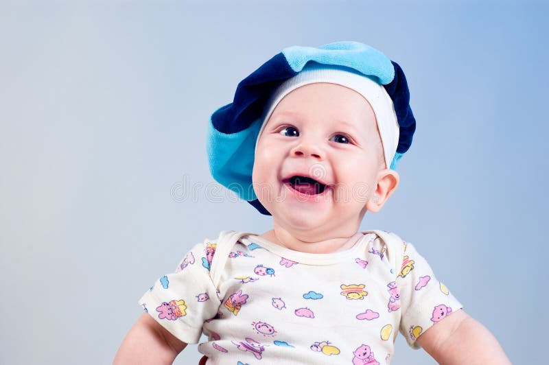 Amusing baby boy in a beret