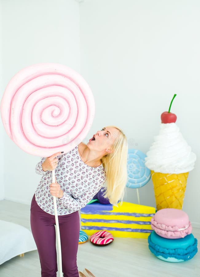 Amusing Blonde Girl Express Surprise On Decorated Background With