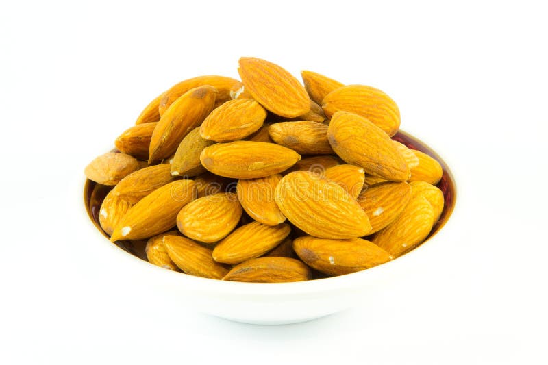 Amêndoas no prato imagem de stock