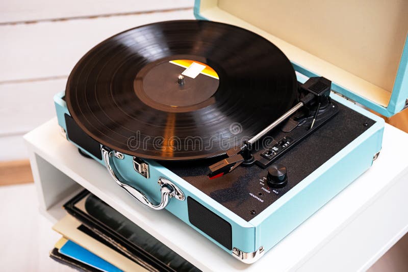 Analog Vinyl Record Player with Disc. Modern Turntable Audio Equipment