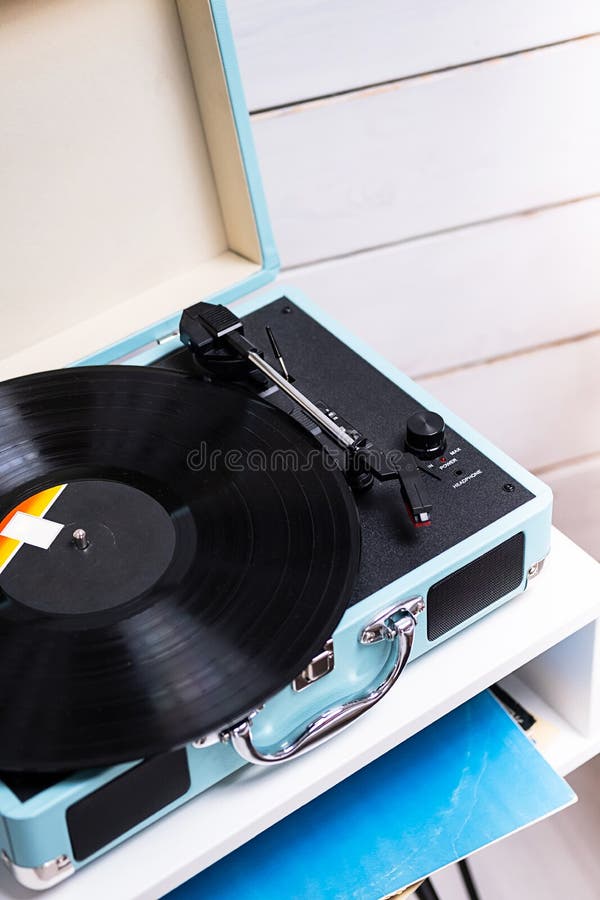 Analog Vinyl Record Player with Disc. Modern Turntable Audio Equipment