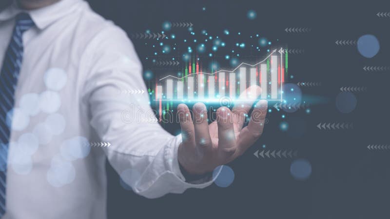 Analysts trading share strategy analyzing from diagram graph for investment to the future. Businessman holding horizontal graph for analysis share, currency, forex, for growth business to the future.