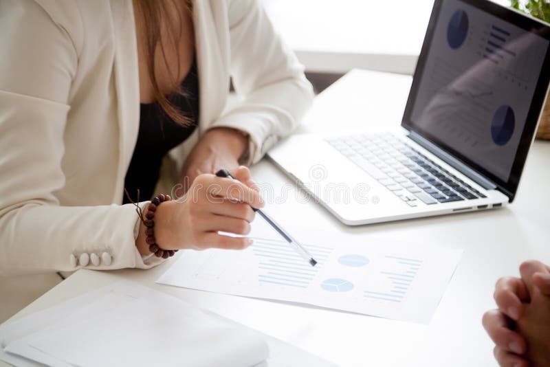 Analyzing new marketing plan and sales statistics concept, close royalty free stock photography Analyzing new marketing plan and sales statistics concept, close royalty free stock photography