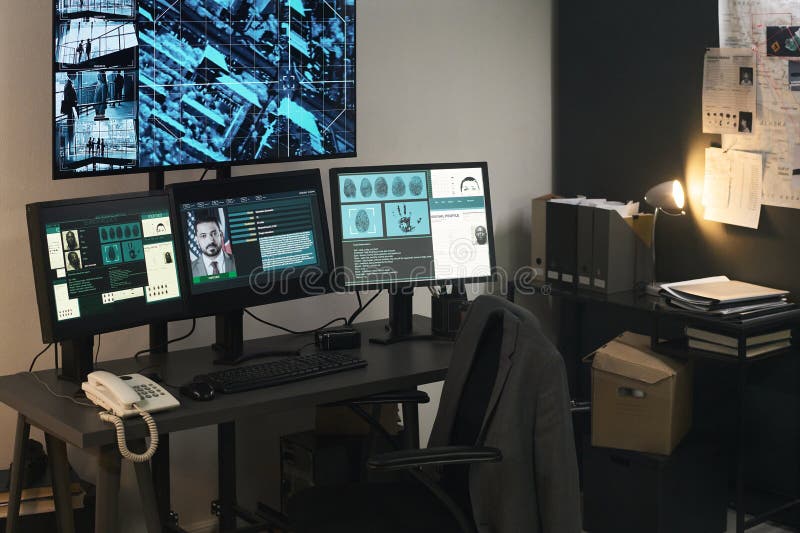 Analyzing Security Footage in Modern Surveillance Room stock photo