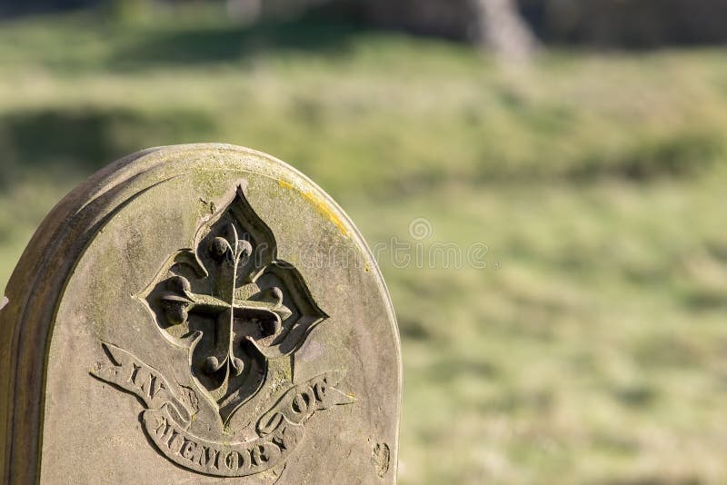Ancestry and genealogy. Ancient gravestone inscribed with in memory of