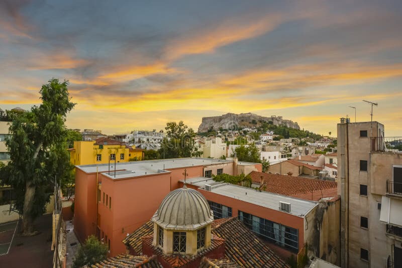 The ancient Acropolis and Parthenon on Acropolis hill viewed from the Plaka region below in the city of Athens, Greece at sunset stock photos The ancient Acropolis and Parthenon on Acropolis hill viewed from the Plaka region below in the city of Athens, Greece at sunset stock photos