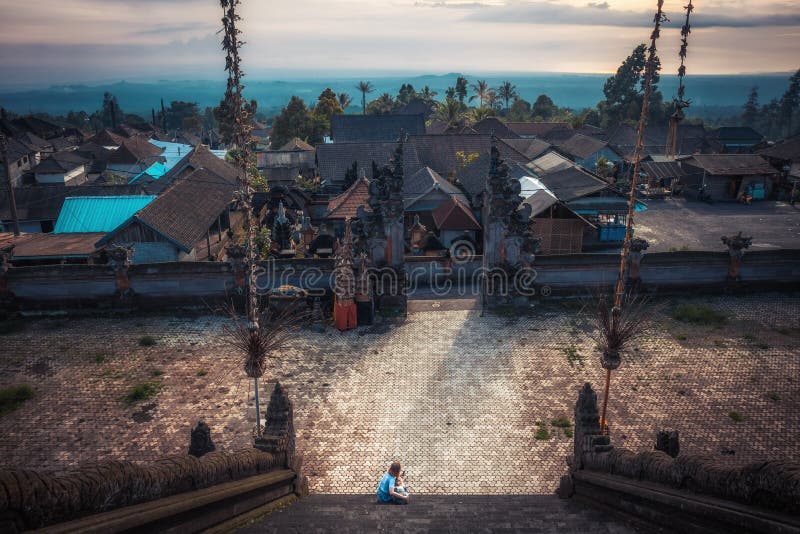 Bali Pura Besakih temple panorama high viewpoint from temple stairs scenery on horizon during sunset as Bali travelling lifestyle royalty free stock photos