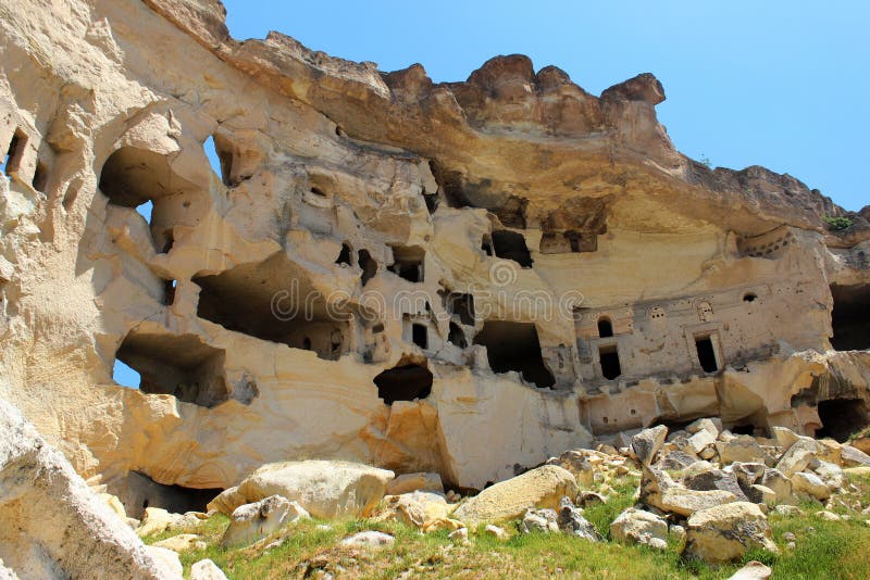 Ancient Cave City of Cavusin in Cappadocia, Turkey Stock Photo - Ancient Cave City Cavusin CappaDocia Turkey Ancient Cave City Cavusin CappaDocia Turkey 135192898