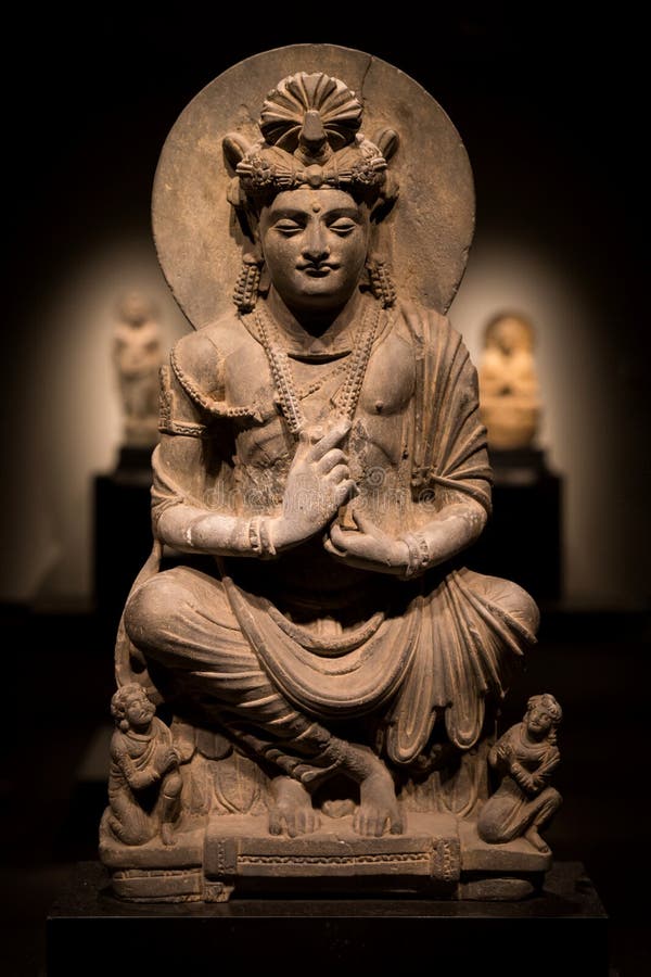 Ancient cross-legged Bodhisattva schist statue image in 2nd century, Kushan dynasty from Gandhara, Pakistan