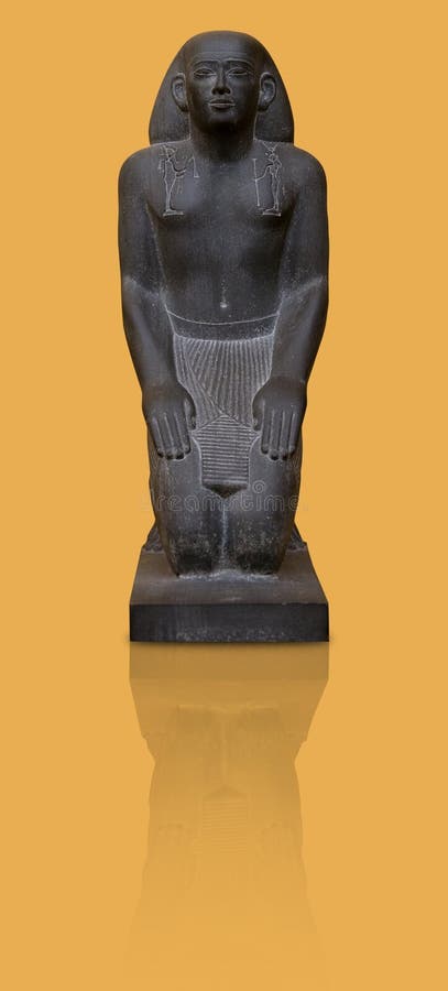 Ancient egyptian black basalt statue isolated on yellow background. Design element with clipping path