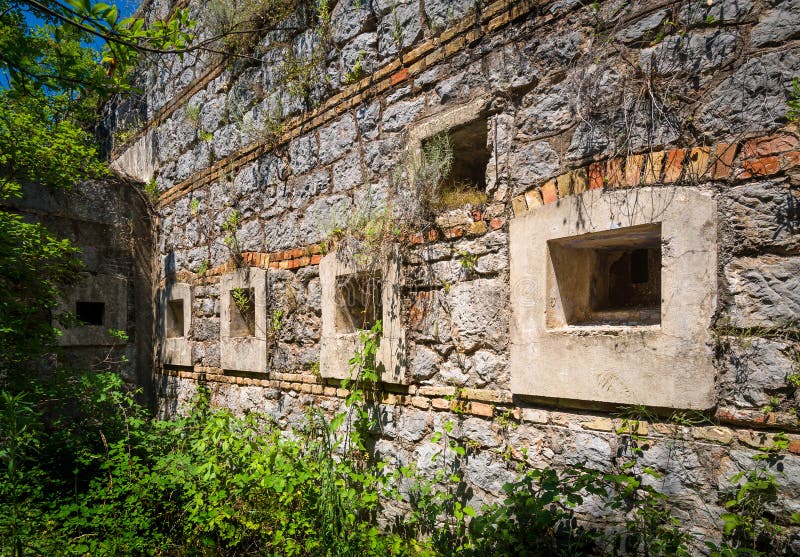 Ancient fortification wall with windows