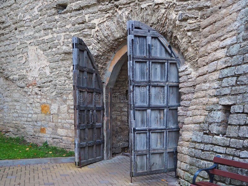 Historical monument. Ancient fortress gates in the wall of the Pskov Krom. City of Pskov, Russia.