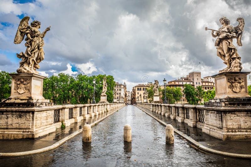 Ancient historical bridge with statues. Ponte Sant Angelo in Rome in Italy. Bad weather with clouds and rain. royalty free stock photography Ancient historical bridge with statues. Ponte Sant Angelo in Rome in Italy. Bad weather with clouds and rain. royalty free stock photography