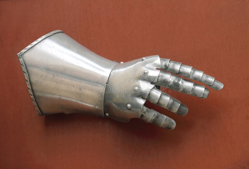 Ancient knight Iron glove stock photos