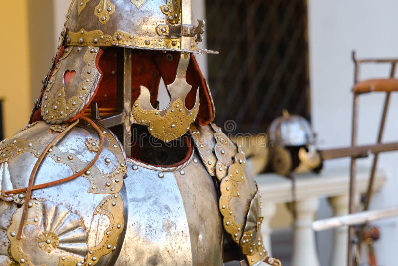 An ancient Knight& x27;s helmet with armor. A medieval concept stock photography
