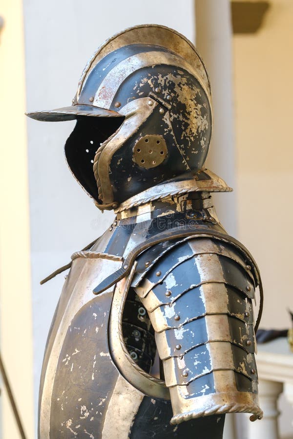 An ancient Knight's helmet with armor. A medieval concept stock photo