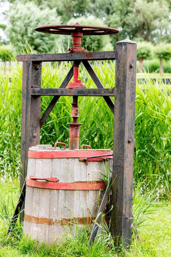Ancient machine of the Dutch to press cheese royalty free stock photo