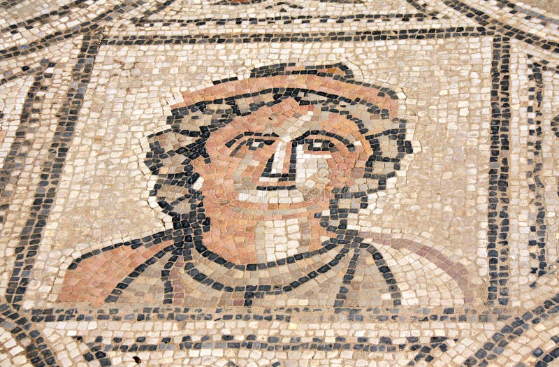 Ancient mosaic with woman face, Volubilis, Morocco royalty free stock images Ancient mosaic with woman face, Volubilis, Morocco royalty free stock images