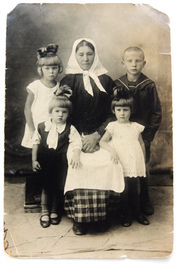 Ancient photo of grandmother with children stock photo Ancient photo of grandmother with children stock photo