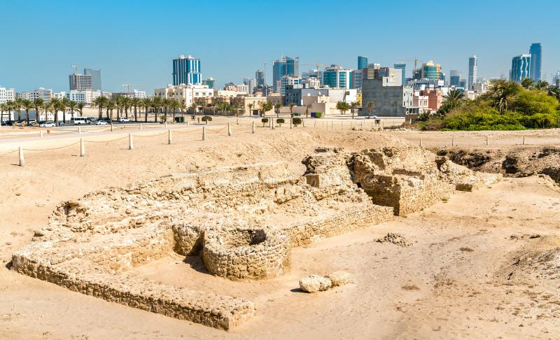 Ruins of Bahrain Fort with Skyline of Manama. a UNESCO World Heritage ...