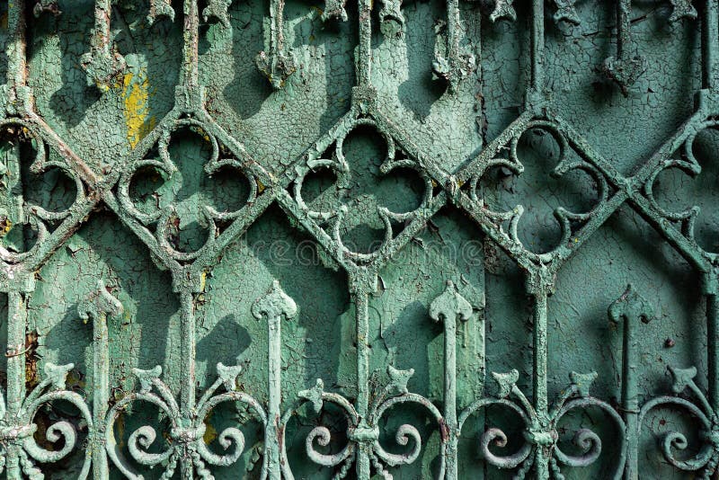 Ancient rusty forged fence decoration stock image