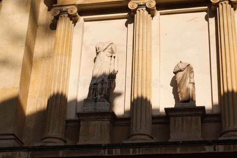 Ancient statues on the facade of the building, Istanbul, Turkey stock photos