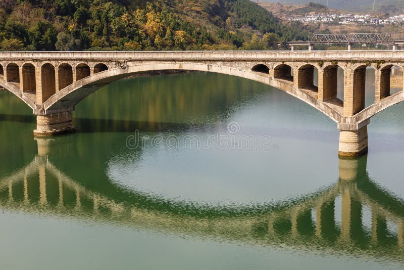 Ancient stone bridge over River royalty free stock photo