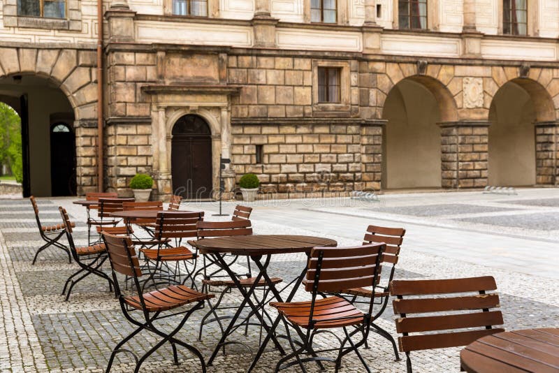 Ancient stone castle with coffee tables, Europe stock images Ancient stone castle with coffee tables, Europe stock images