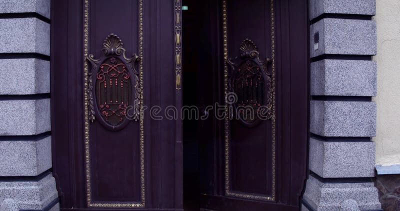 Ancient wooden doors on the street stock video footage