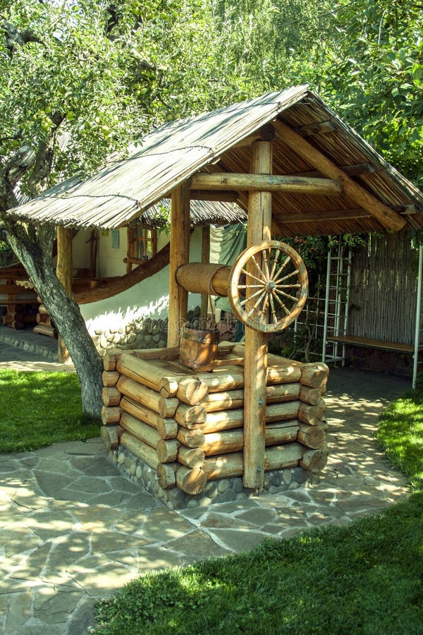 Ancient wooden well. summer sunny day stock photography Ancient wooden well. summer sunny day stock photography