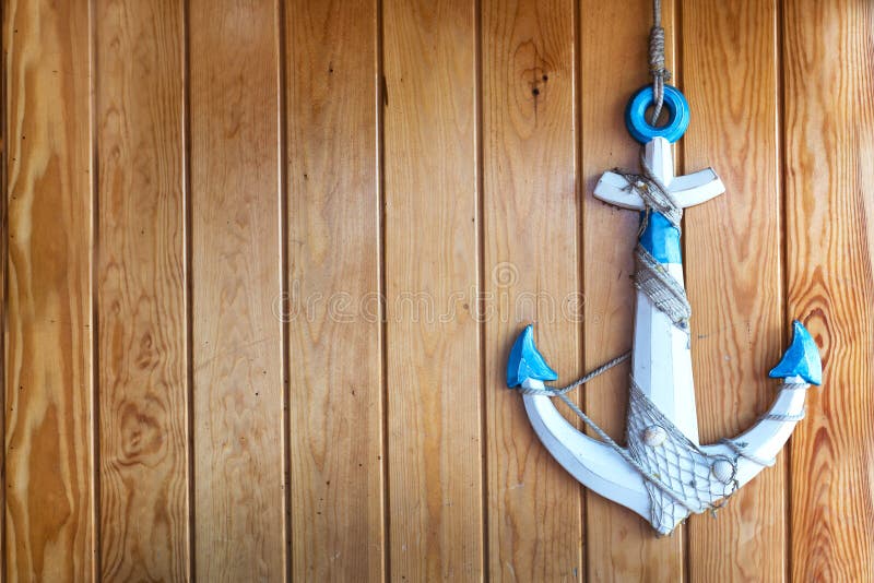 Ancoraggio della nave su fondo di legno con spazio di copia immagini stock libere da diritti Ancoraggio della nave su fondo di legno con spazio di copia immagini stock libere da diritti