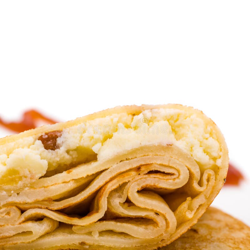 Angefüllte Pfannkuchen auf Weißabschluß oben stockfoto Angefüllte Pfannkuchen auf Weißabschluß oben stockfoto
