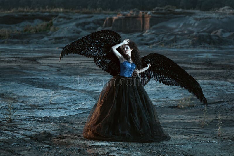 Angel with black wings royalty free stock images