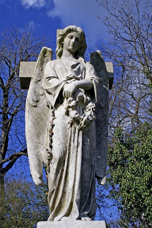Angel & Cross stock image. Image of angel, gravestone, graveyard - 803337