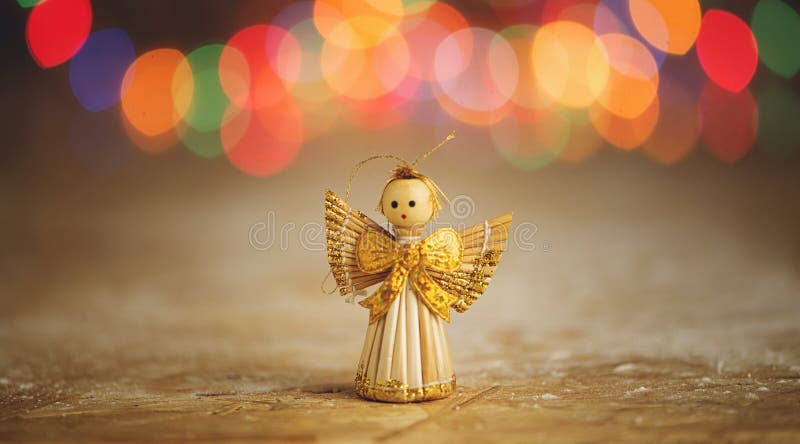 An angel doll Christmas decorations. Bokeh lights.