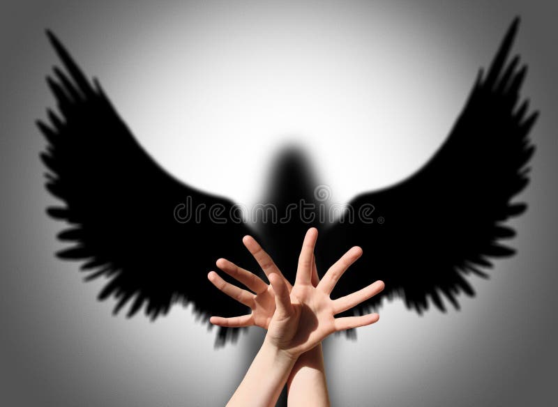 Angel, hand shadow like wings of darkness royalty free stock photo Angel, hand shadow like wings of darkness royalty free stock photo