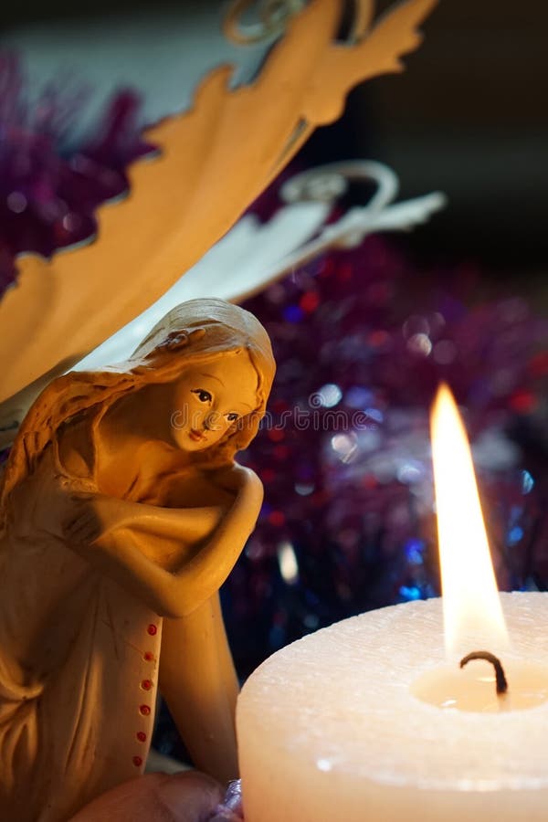 Angel is Heated at a Candle Flame Stock Photo Image of candle