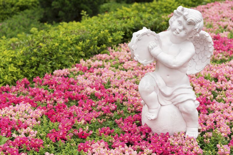 Angel sculpture in garden stock photo. Image of beauty 75130106