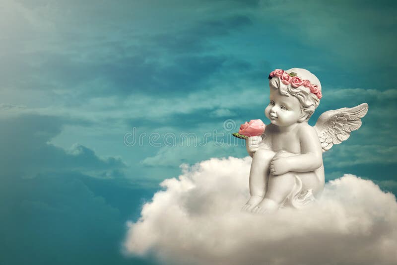 Angel sitting on the cloud stock photos Angel sitting on the cloud stock photos