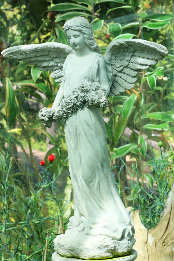 Angel Statue in Flower Garden Stock Image Image of stone, catholic