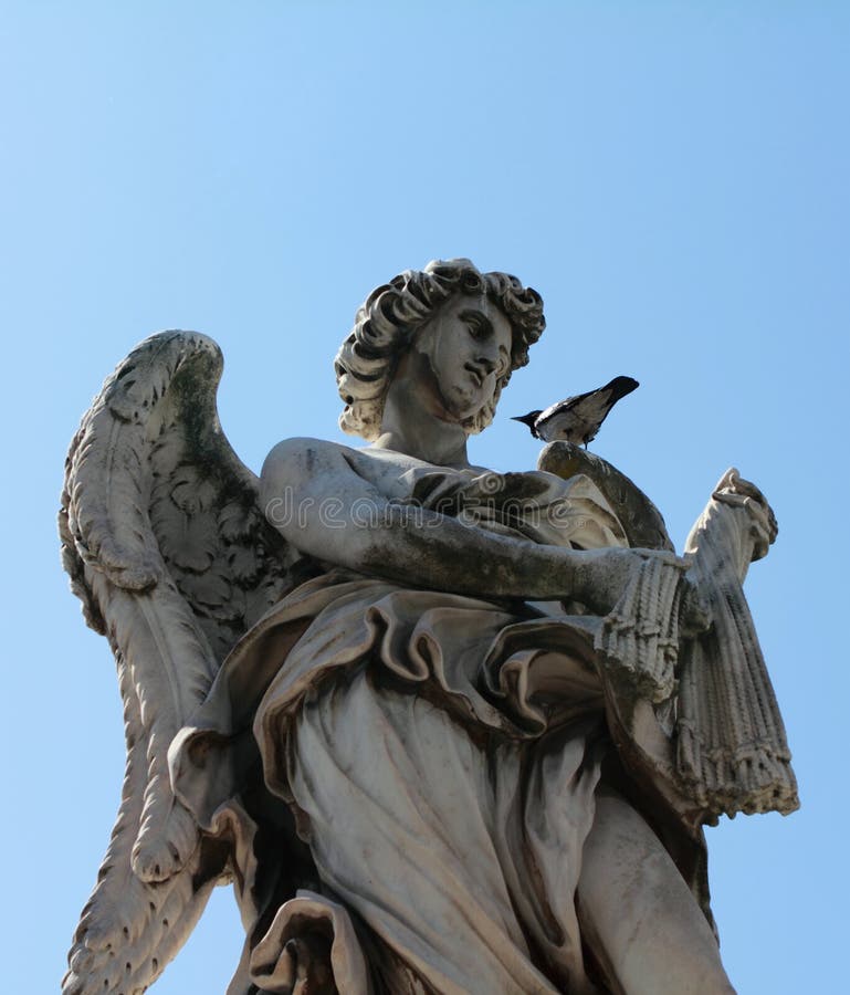 Angel with the Whips sculpture in Rome Italy with pigeon resting on his shoulder. royalty free stock image Angel with the Whips sculpture in Rome Italy with pigeon resting on his shoulder. royalty free stock image
