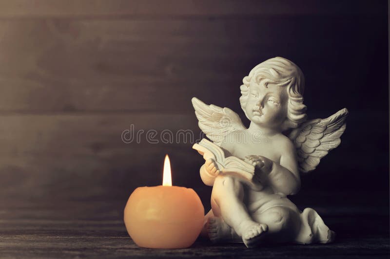Angel and White Candle on Dark Background Stock Image Image of