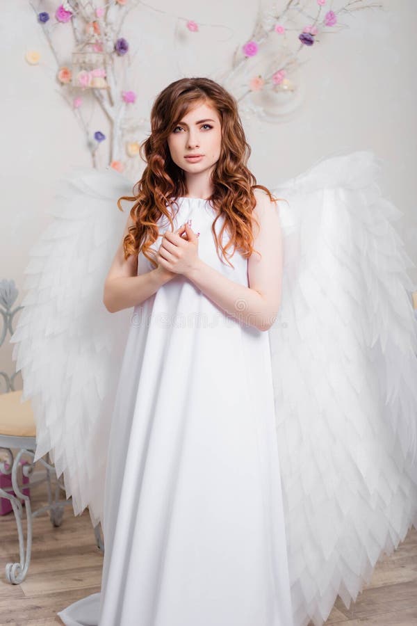 Angel in a White Dress with Wings Stock Photo - Image of cosplay ...