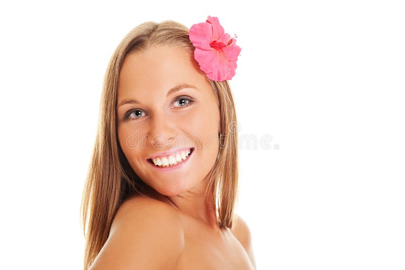 Angenehme Frau mit roter Blume lizenzfreies stockbild