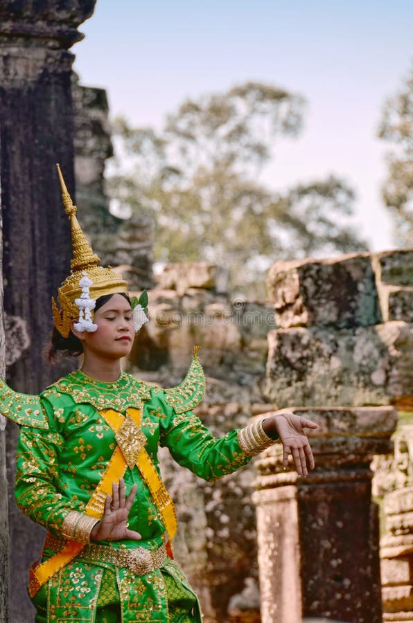 Angkor-Tom, Cambodia â€“ November 12, 2014: Khmer classical female dancer performing in traditional Cambodian costume