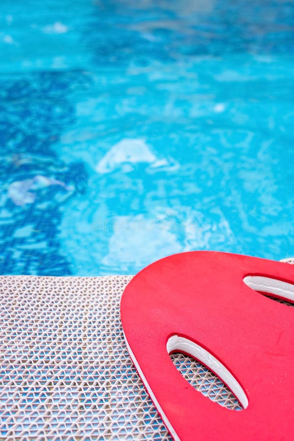 Ed Floating Pad Near a Swimming Pool Vertical Composition Stock Image