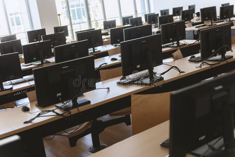 Angled view of businessplace with many desktop computers. royalty free stock image Angled view of businessplace with many desktop computers. royalty free stock image