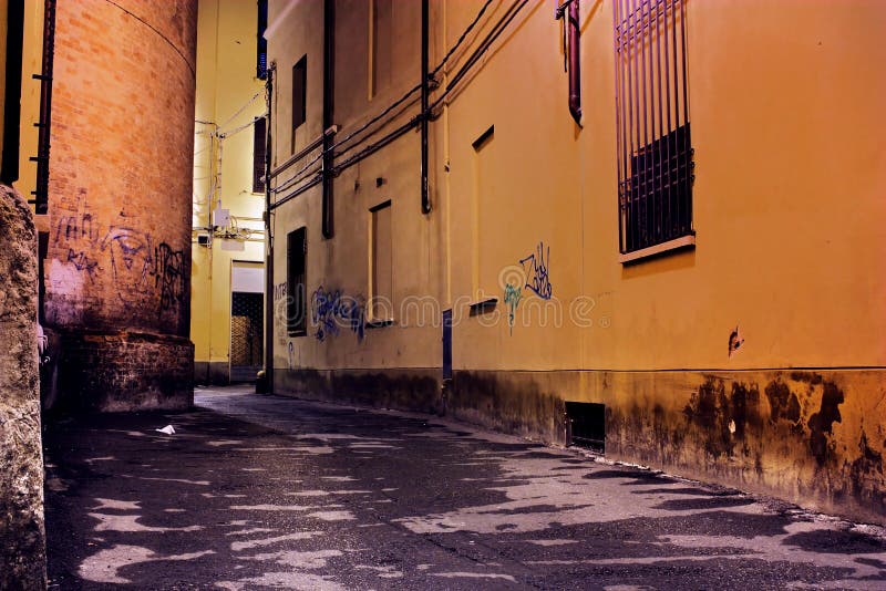 Grunge dark alley - slums of the city - squalid dirty corner of street - italian decadent distressed old town - street at night - urban decay. Grunge dark alley - slums of the city - squalid dirty corner of street - italian decadent distressed old town - street at night - urban decay