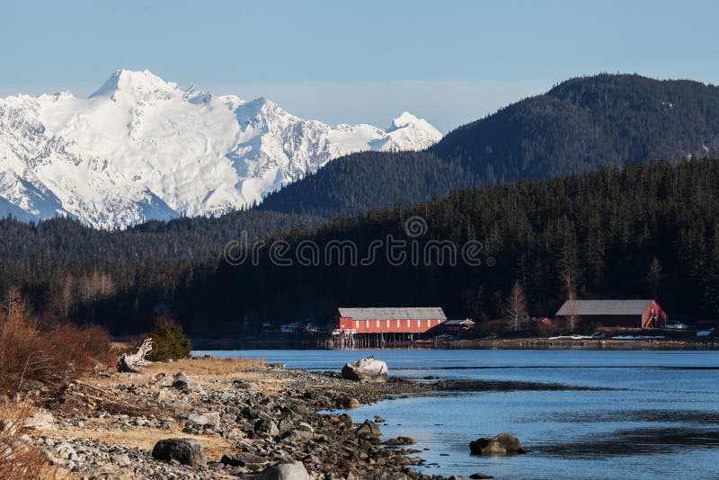 View of Letnikof Cove near Haines Alaska with the old red cannery buildings. View of Letnikof Cove near Haines Alaska with the old red cannery buildings.